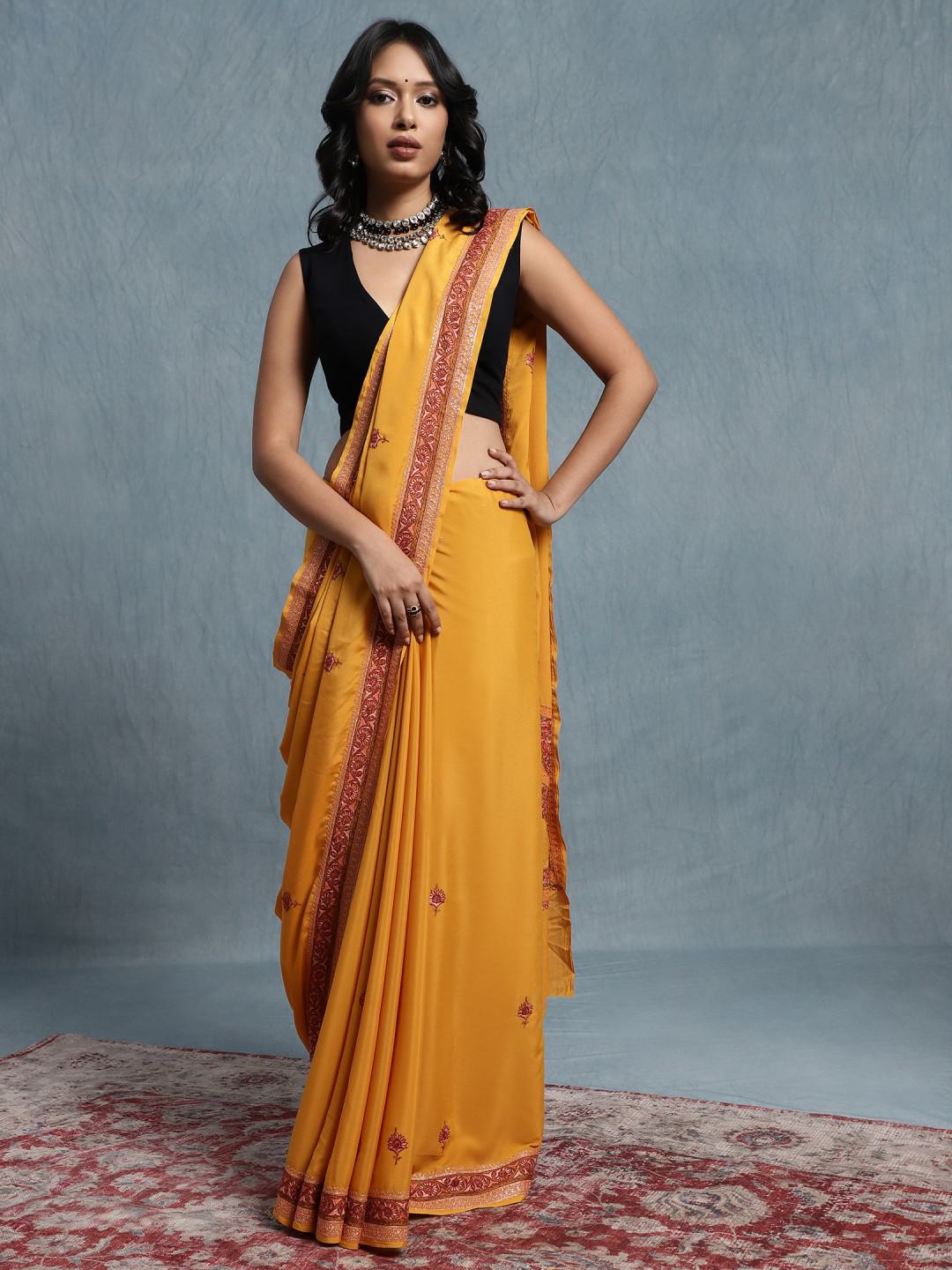 PURE MUSTARD YELLOW CREPE SAREE WITH SOZNI HAND EMBROIDERY